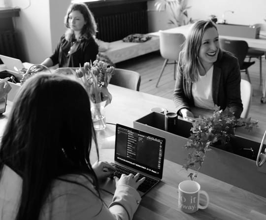 girls on office table working