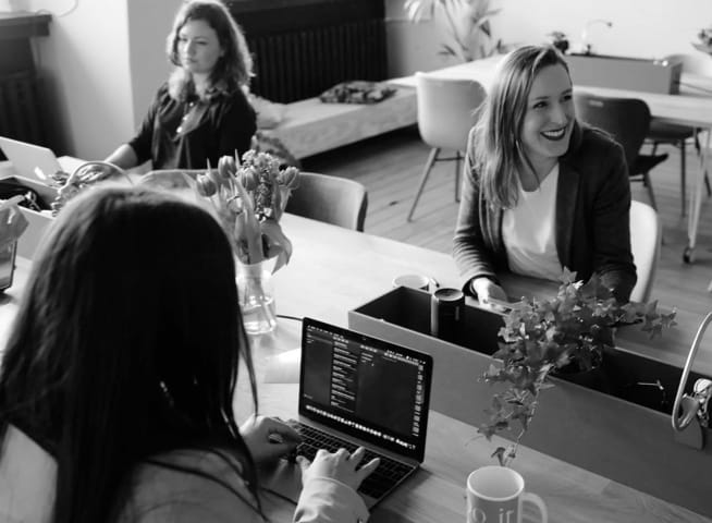 girls on office table working